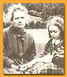 Irene Curie points to Marie's radiation-scarred fingertips