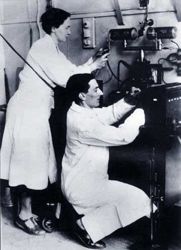 The Joliot-Curies in their laboratory