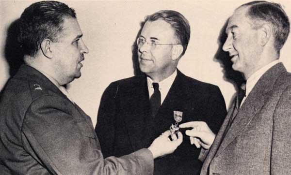 Lawrence's Medal for Merit being admired by General Groves and UC President Sproul